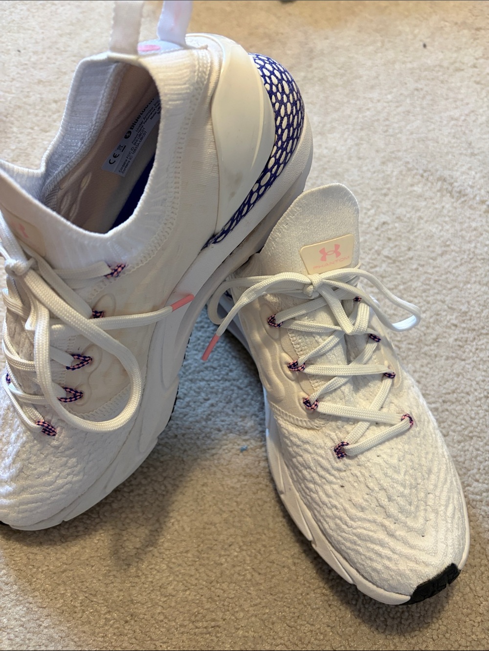 Under Armour Women’s White Knit Running Shoes with Purple and Pink Accents